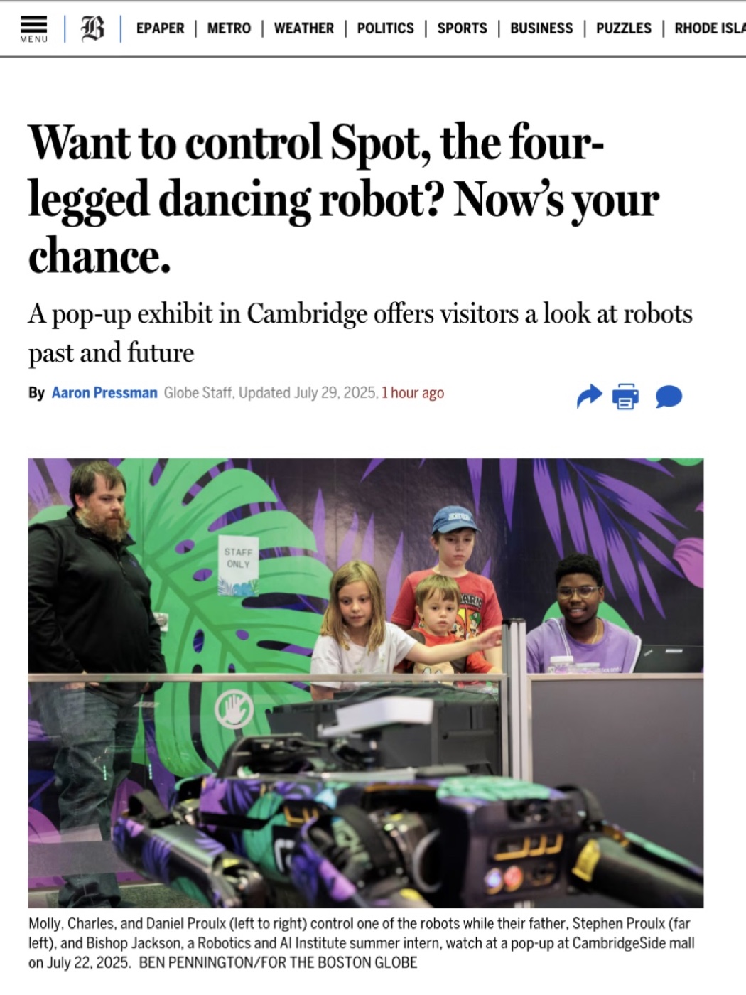 Boston Globe article featuring Bishop Jackson supporting visitors as they control Spot